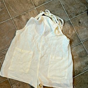 Never worn romper. Creamy white color. Size XL